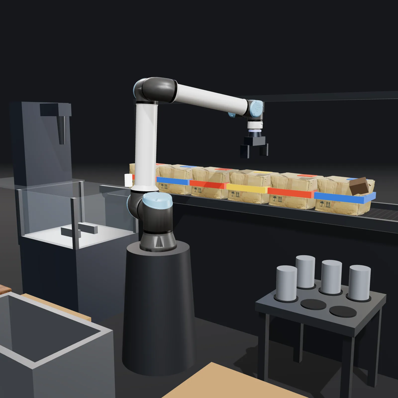 Kata's digital twin of a palletising cell: a UR10e reaching for a box on the conveyor